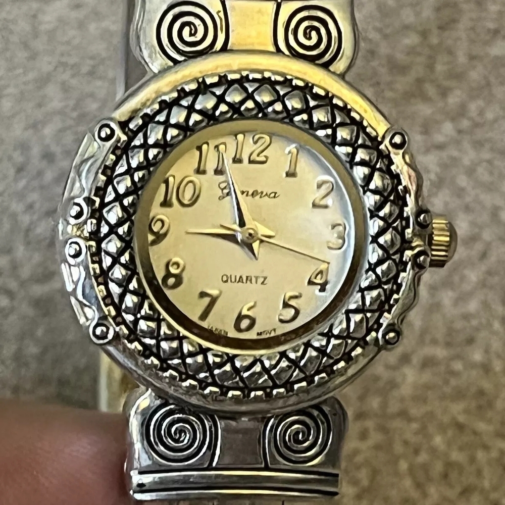 Geneva Platinum Vintage Woman's Silver and Gold Quartz Bangle Bracelet Watch.